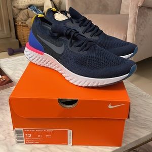 Bnib Nike epic react flyknit size 12 navy blue pink brand new